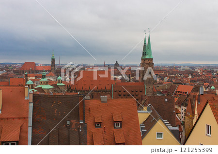 Nuremberg cityscape, Germany. Old Bavarian city with orange rooftops. Medieval centre of Nuremberg. Sightseeing place in Nuremberg. Tourism and vacations in Europe. Cloudy day in Nuremberg. Nuremberg cityscape, Germany. Old Bavarian city with orange rooftops. Medieval centre of Nuremberg. Sightseeing place in Nuremberg. Tourism and vacations in Europe. Cloudy day in Nuremberg. 121255399