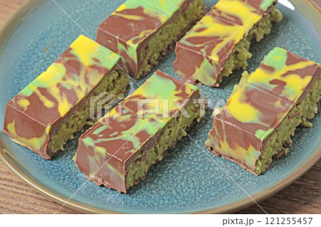 Dubai chocolate bar with pistachio paste and kataifi dough. Confectionery and sweets. 121255457