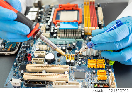 Repairing and upgrade Samsung mobile phone, electronic, computer hardware and technology concept. Repairing and upgrade Samsung mobile phone, electronic, computer hardware and technology concept. 121255700