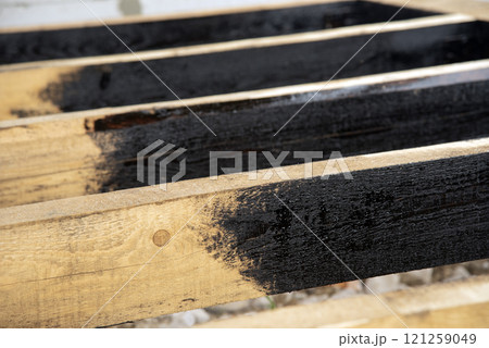 Waterproofing of wooden boards Waterproofing of wooden boards 121259049