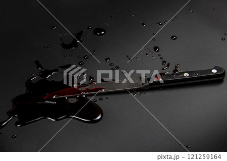 Knife with blood on the white background. Bloody background with knife - conceptual photo. Knife with blood on the white background. Bloody background with knife - conceptual photo. 121259164