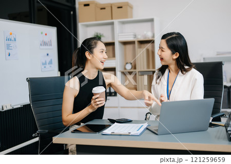 Two businesswoman and man discuss investment project working and planning strategy with tablet laptop computer Two businesswoman and man discuss investment project working and planning strategy with tablet laptop computer 121259659
