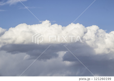 Cloud in the blue sky. A beautiful clouds against the blue sky background. Beautiful cloud pattern in the sky. Cloud in the blue sky. A beautiful clouds against the blue sky background. Beautiful cloud pattern in the sky. 121260199