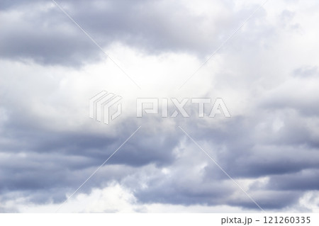 Amazing clouds in the sky. A beautiful clouds against the white sky background. Amazing cloud pattern in the sky can be used in design concept 121260335