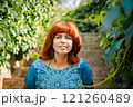 The girl with the red hair in the leaves 121260489
