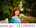 The girl with the red hair in the leaves 121260491