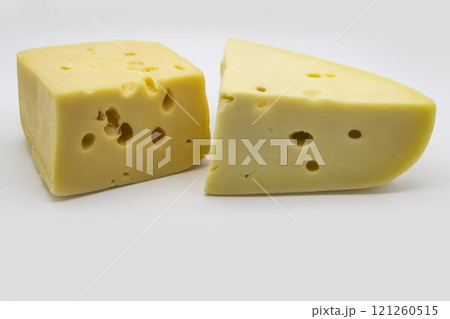 Delicious fresh hard cheese on a white background. Healty and very tasty cheese. 121260515