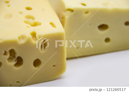 Delicious fresh hard cheese on a white background. Healty and very tasty cheese. 121260517