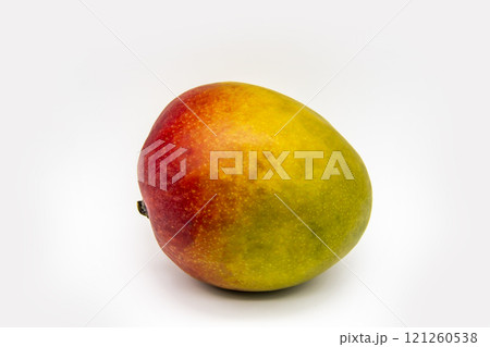 Mango fruit isolated on white background. One ripe mango fruit isolated. Healthy one whole fresh big ripe red mango fruit for the diet meal 121260538