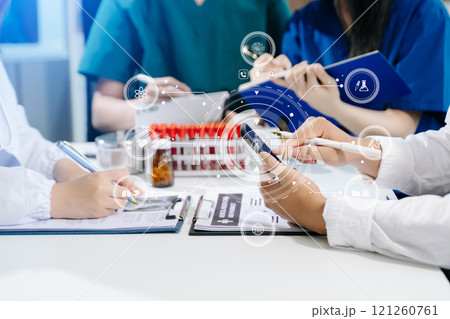 Medical technology network team meeting concept. Doctor hand working with smart phone modern digital tablet and laptop computer Medical technology network team meeting concept. Doctor hand working with smart phone modern digital tablet and laptop computer 121260761