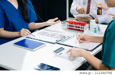 Meeting team of doctor and medical staff Consultation about the treatment of heart disease, pneumonia, gastrointestinal Meeting team of doctor and medical staff Consultation about the treatment of heart disease, pneumonia, gastrointestinal 121260798