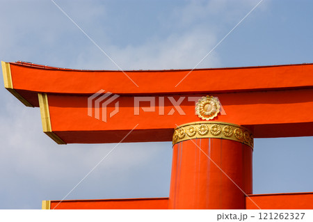 Close up details on a red Torii gate in famous Fushimi Inari Shinto shrine in Kyoto, Japan Close up details on a red Torii gate in famous Fushimi Inari Shinto shrine in Kyoto, Japan 121262327