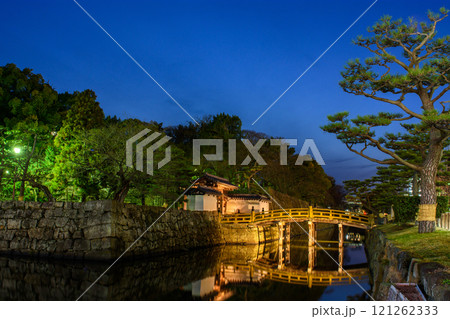 Bridge over water moat at the entrance of Wakayama castle, old historic Japanese castle in Wakayama city in Kansai, Japan Bridge over water moat at the entrance of Wakayama castle, old historic Japanese castle in Wakayama city in Kansai, Japan 121262333