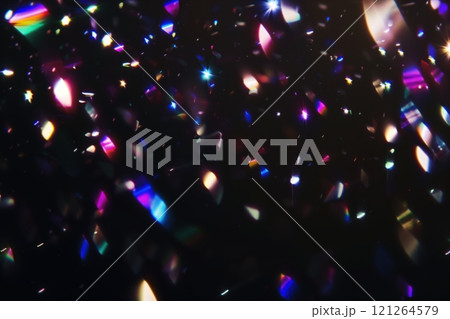 Abstract Colorful Light Beams and Bokeh overlay with Sparkling Particles on Dark Background Abstract Colorful Light Beams and Bokeh overlay with Sparkling Particles on Dark Background 121264579