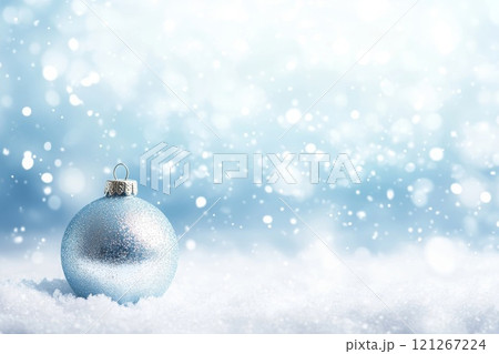 Christmas bauble over the winter, snowy background with copy space. Christmas bauble over the winter, snowy background with copy space. 121267224