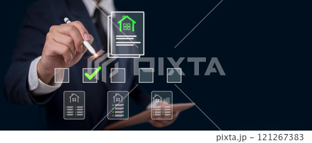 Businessman selecting real estate document with virtual interface 121267383