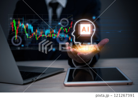 Businessman holding AI head icon with financial data graph artificial intelligence in finance concept Businessman holding AI head icon with financial data graph artificial intelligence in finance concept 121267391