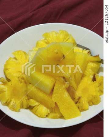 A vibrant platter of juicy watermelon and pineapple chunks A vibrant platter of juicy watermelon and pineapple chunks 121267654