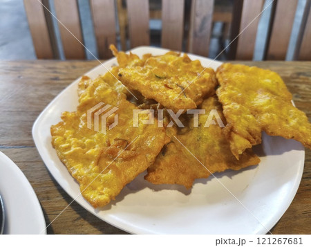Golden brown Tempe Mendoan, a crispy Indonesian snack 121267681