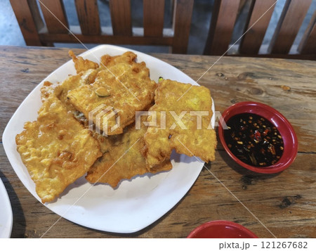Golden brown Tempe Mendoan, a crispy Indonesian snack 121267682