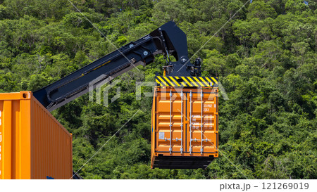 Reach stacker cargo forklift container box import export logistic transportation industrial, Reach stacker pick up container, Reach stacker container loader crane lifting maritime cargo container. Reach stacker cargo forklift container box import export logistic transportation industrial, Reach stacker pick up container, Reach stacker container loader crane lifting maritime cargo container. 121269019