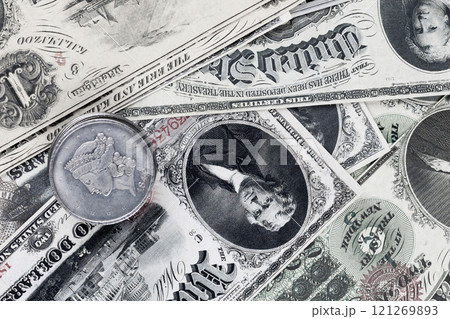 Old west greenback US paper money and silver certificates with silver dollar coins Old west greenback US paper money and silver certificates with silver dollar coins 121269893