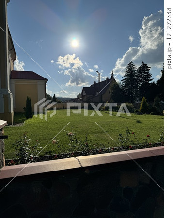 Sunlit Garden with Rustic Charm in the Countryside Sunlit Garden with Rustic Charm in the Countryside 121272338