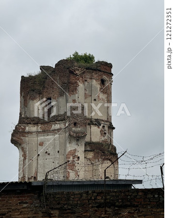 Weathered Brick Tower with Overgrown Top Weathered Brick Tower with Overgrown Top 121272351