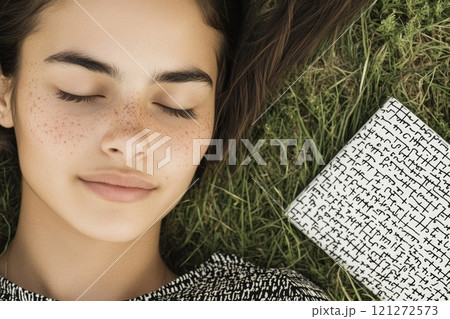 Peaceful Young Woman Relaxing Outdoors with Book on Grass Aai generative 121272573