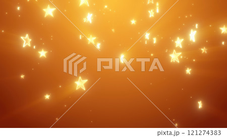Golden glowing stars scattered across a warm orange background, creating a radiant, magical atmosphere 121274383