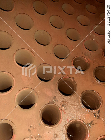 Internal View of a Steam Boiler Drum Featuring Rolled Tubes in a Manufacturing Facility 121275420