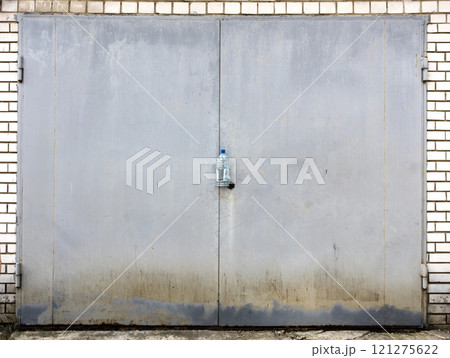 old metal door to the car garage 121275622