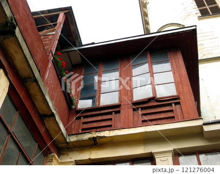 Old Wooden Attic in an Armenian Courtyard in Lviv Showcasing Traditional Architecture and Charm Old Wooden Attic in an Armenian Courtyard in Lviv Showcasing Traditional Architecture and Charm 121276004