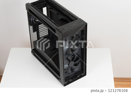 Big tower, empty PC case, chassis, photo of the top of the computer case, without upper and front panel, without tempered-glass left panel, one rear 140 mm and two 200mm front system fans Big tower, empty PC case, chassis, photo of the top of the computer case, without upper and front panel, without tempered-glass left panel, one rear 140 mm and two 200mm front system fans 121276108