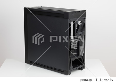 Back side of empty big tower computer case, chassis , effortless maneuvering with two built-in wheels on white background. At the bottom is a place for power supply unit Back side of empty big tower computer case, chassis , effortless maneuvering with two built-in wheels on white background. At the bottom is a place for power supply unit 121276215