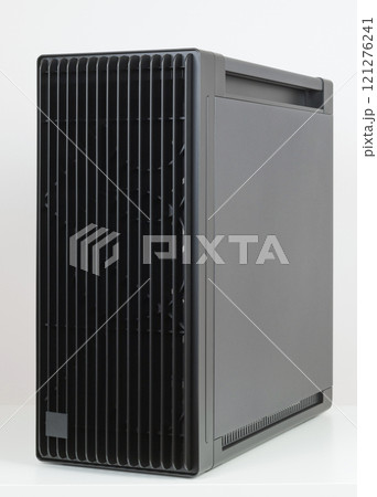 Side view of empty  big tower, PC case, chassis, 15.5 mm front panel grille with 45% porosity for maximum air intake. Studio shoot on white background. 121276241