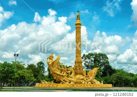 Golden Giant Buddhist Lent Candle Monument with Garuda figure at Thung Si Muang Public Park, Ubon Ratchathani, Thailand. 121280102