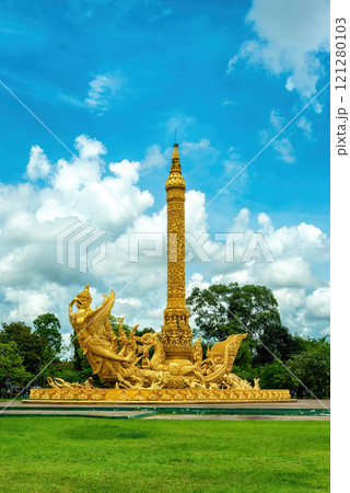 Golden Giant Buddhist Lent Candle Monument with Garuda figure at Thung Si Muang Public Park, Ubon Ratchathani, Thailand. Golden Giant Buddhist Lent Candle Monument with Garuda figure at Thung Si Muang Public Park, Ubon Ratchathani, Thailand. 121280103