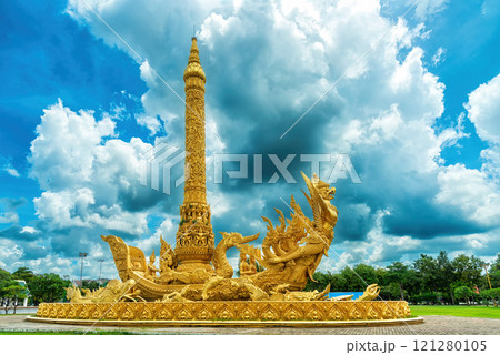Golden Giant Buddhist Lent Candle Monument with Garuda figure at Thung Si Muang Public Park, Ubon Ratchathani, Thailand. 121280105