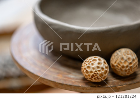 Vintage Crafting Tools for work with clay and Accessories Amidst a Rustic Table  121281224
