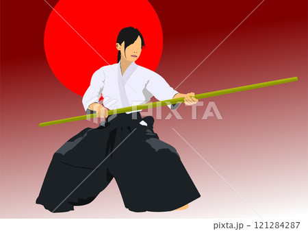Young woman practicing aikido is swinging a wooden stick in front of a red circle Young woman practicing aikido is swinging a wooden stick in front of a red circle 121284287