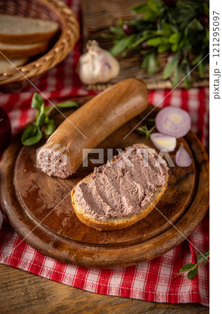 Liver sausage on bread 121295097