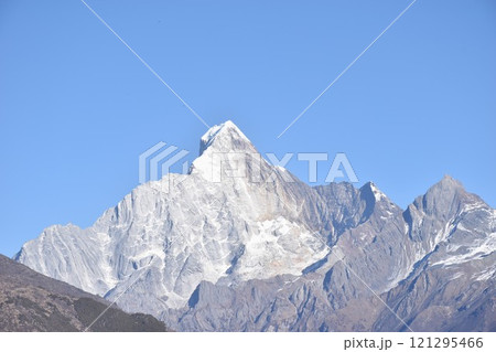 Four Girls Mountain or Siguniangshan as know as Switzerland travel location of China with sky background Four Girls Mountain or Siguniangshan as know as Switzerland travel location of China with sky background 121295466