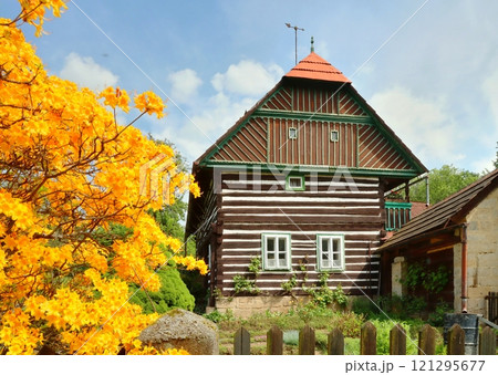 Traditional wooden cottage in Czech republic Traditional wooden cottage in Czech republic 121295677