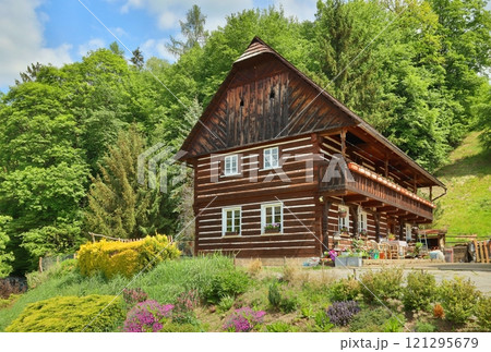 Traditional wooden cottage in Czech republic Traditional wooden cottage in Czech republic 121295679