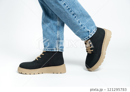 Womens boots, trendy winter shoes, isolate close-up. 121295783