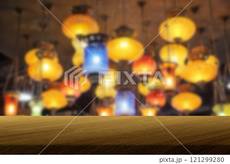 Wooden Table with Blurred Vintage Lamps Background 121299280