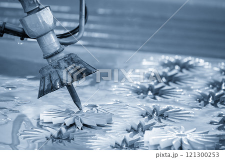 Close-up scene of multi-axis abrasive waterjet cutting machine cutting the aluminum plate. 121300253