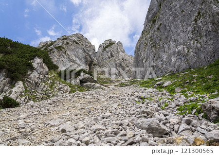 Path to the Angerstein mountain summit, Alps, Gosau, Gmunden district, Upper Austria federal state, sunny summer day, clear blue sky Path to the Angerstein mountain summit, Alps, Gosau, Gmunden district, Upper Austria federal state, sunny summer day, clear blue sky 121300565