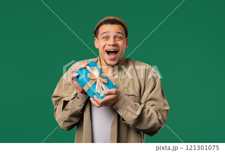 Excited Man Hold Gift Box With Bow. He Is Happy And Flattered By Attention. Guy 121301075